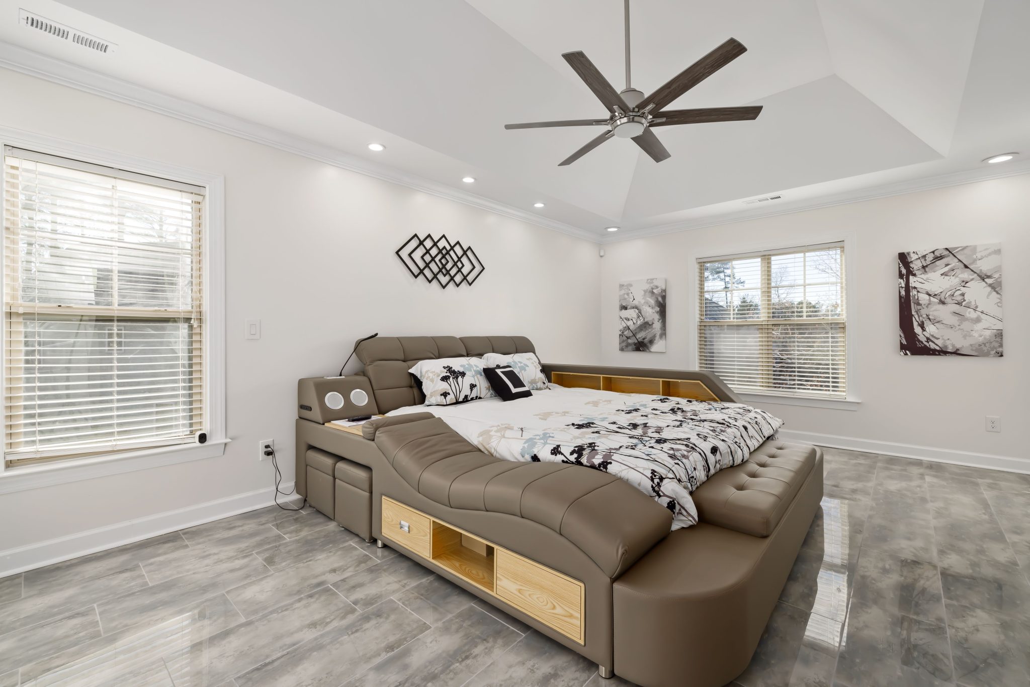 Elegant modern bedroom featuring a multifunctional luxurious bed with contemporary design.