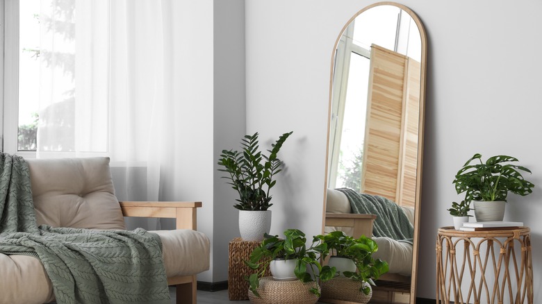 How To Use Mirrors To Make Your Small Space Look Bigger, According To An Expert