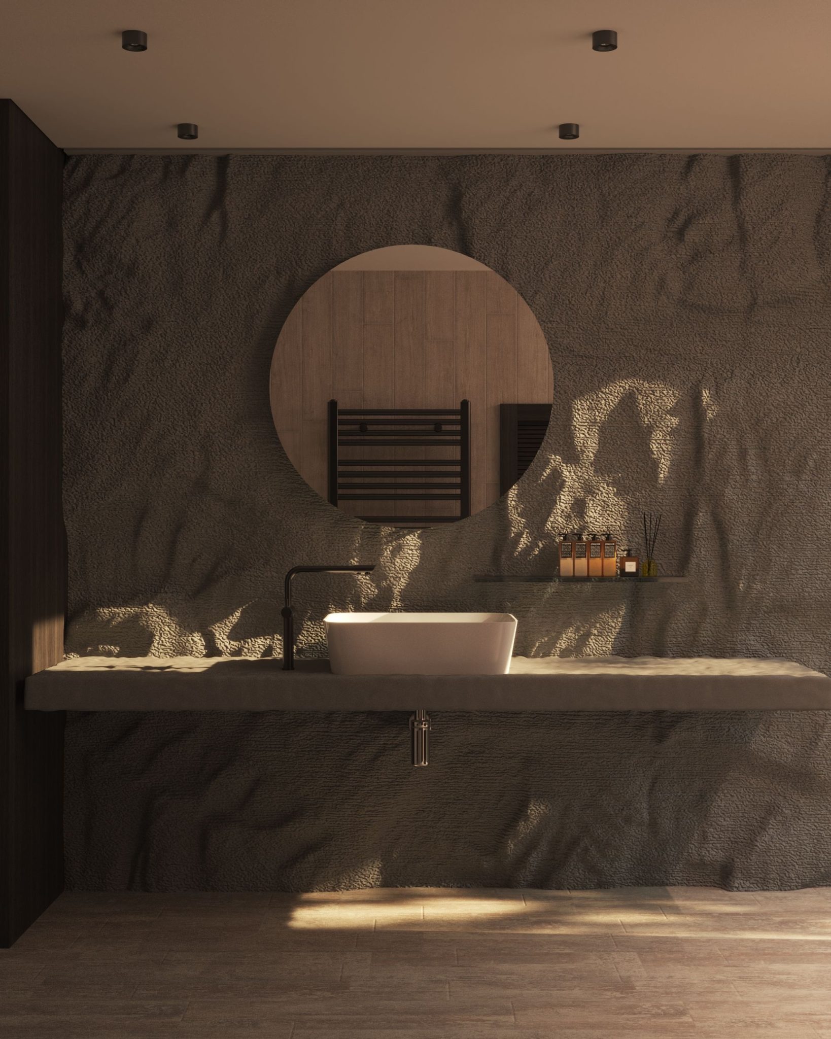 Minimalist luxury bathroom featuring designer sink, round mirror, and textured wall.