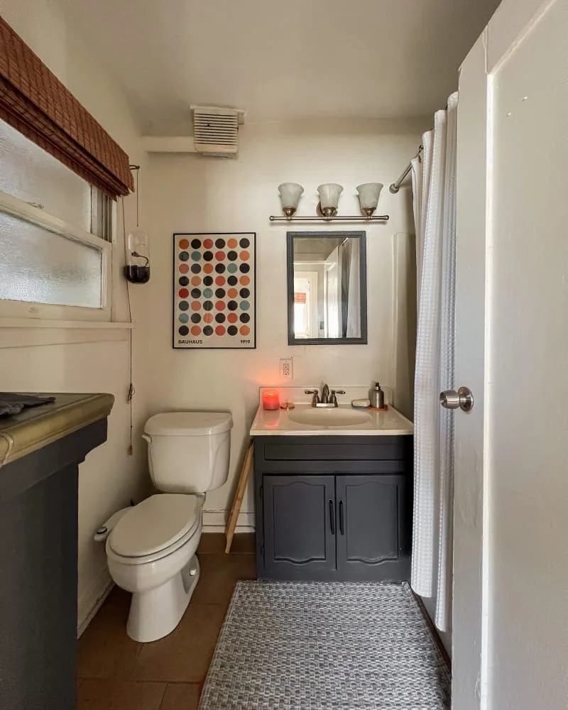 This Once-Dim Bathroom Is Now a Moody, Deep Green Dream
