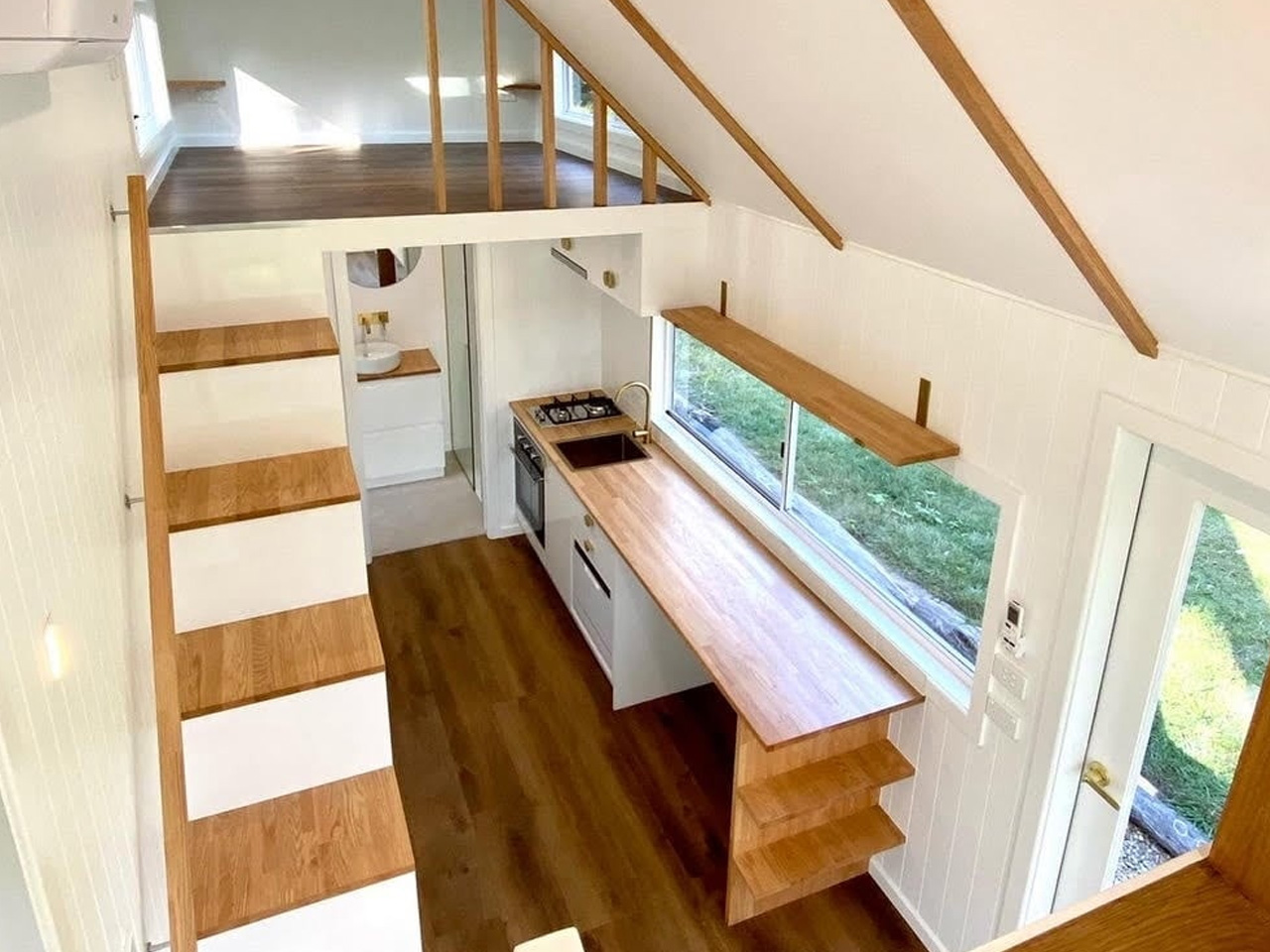 This Stylish Tiny House With Two Lofts Feels Surprisingly Spacious & Airy