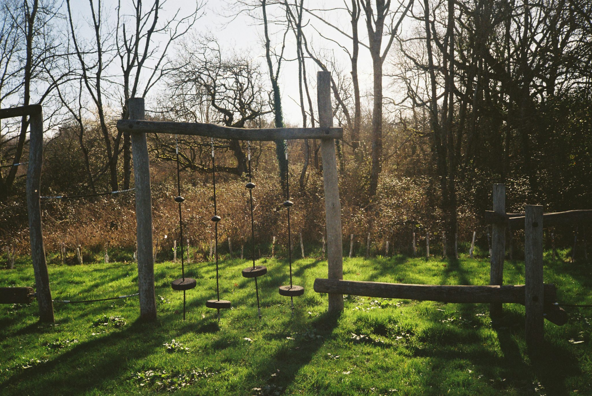 Wooden obstacle course in a grassy field