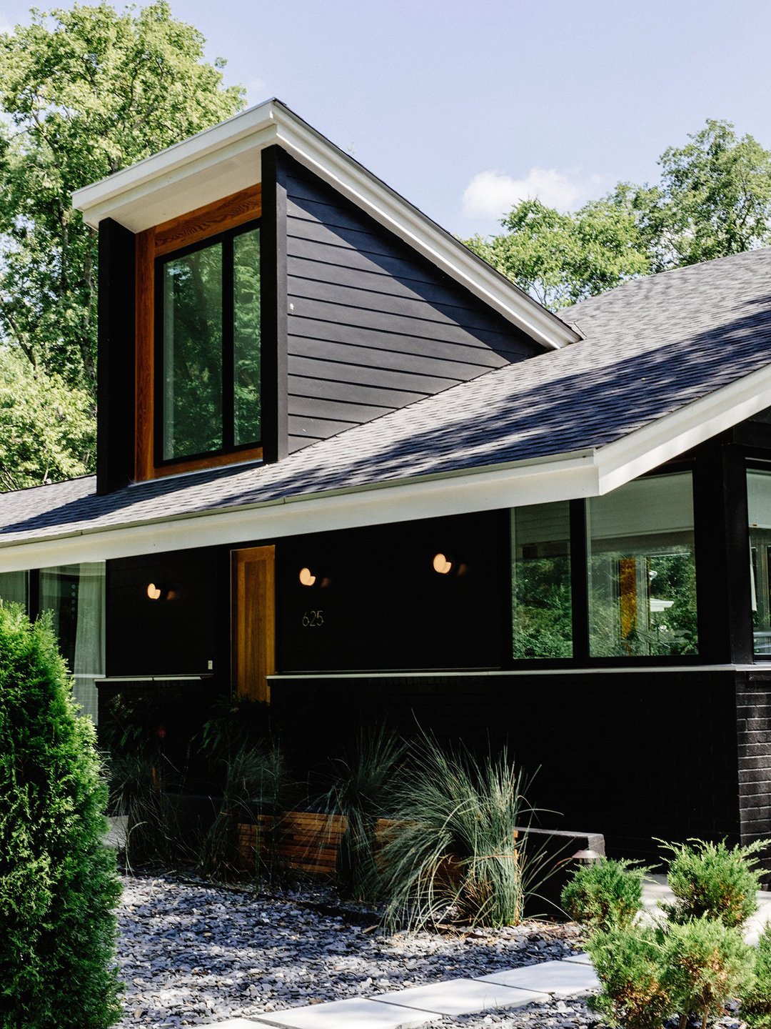 10 Black Exterior Houses That Put the Drama Front and Center | domino
