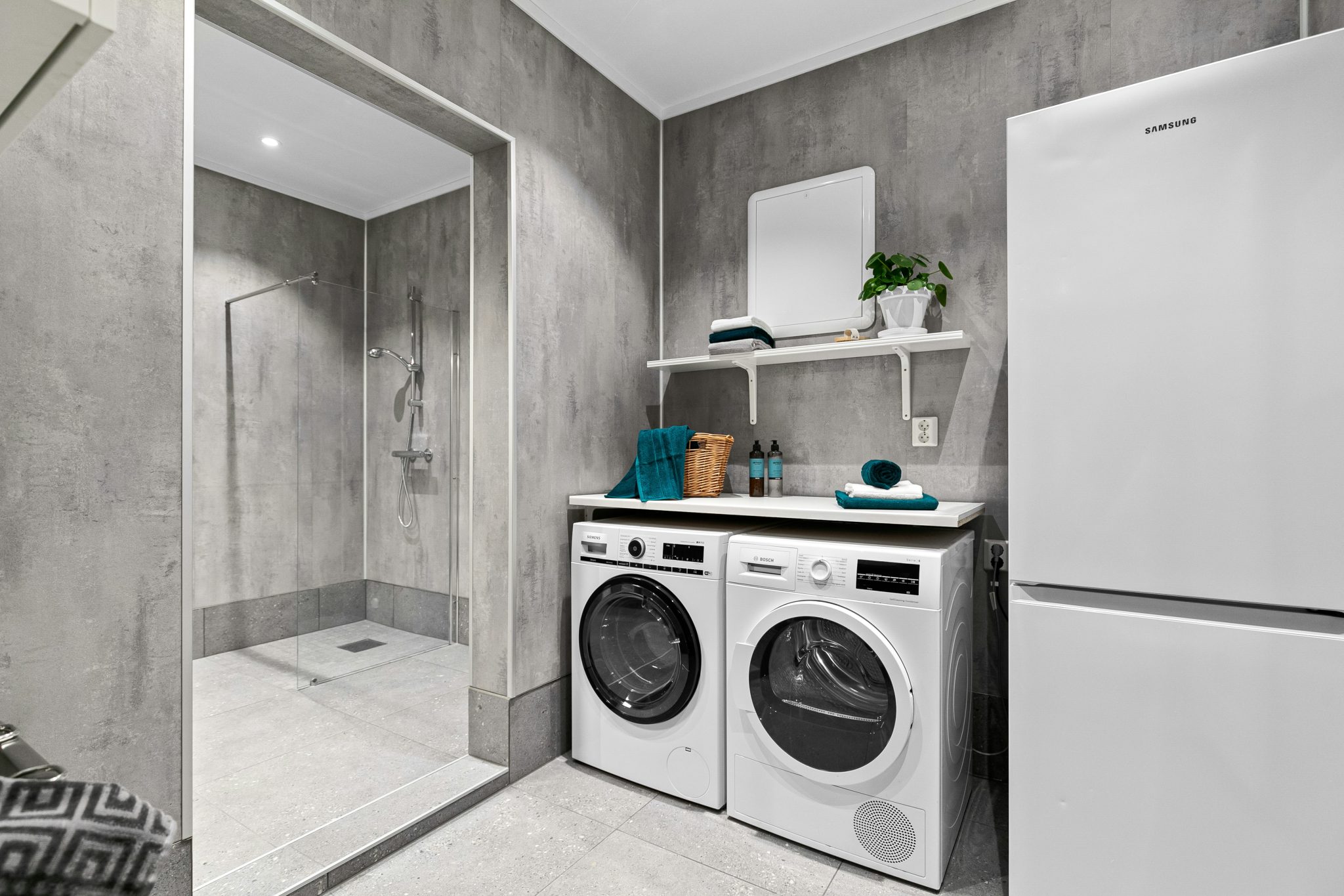 A washer and dryer in a small room