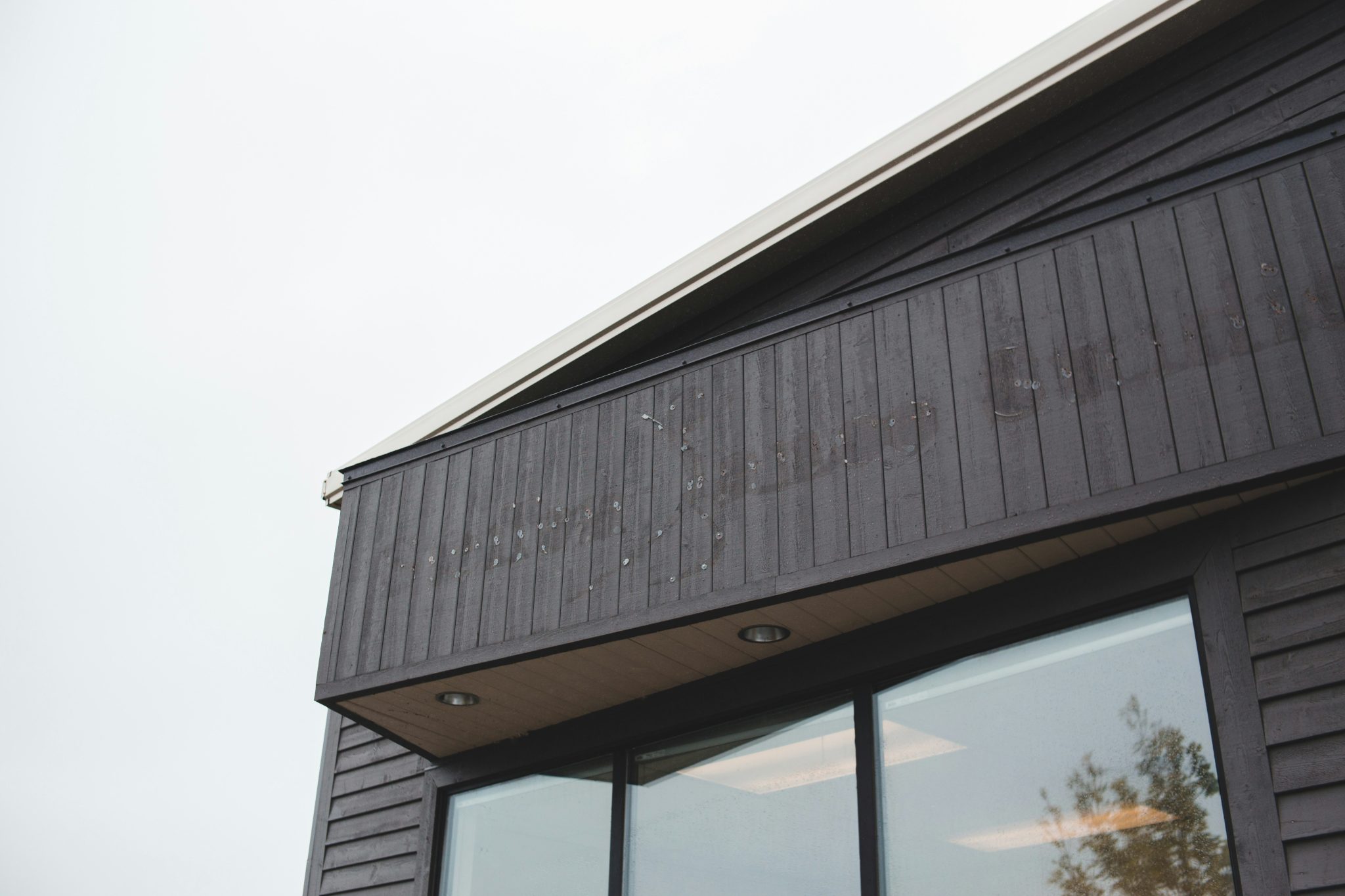 brown wooden house under white sky during daytime
