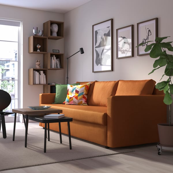 FRIHETEN Sleeper sofa - Faringe brown-orange