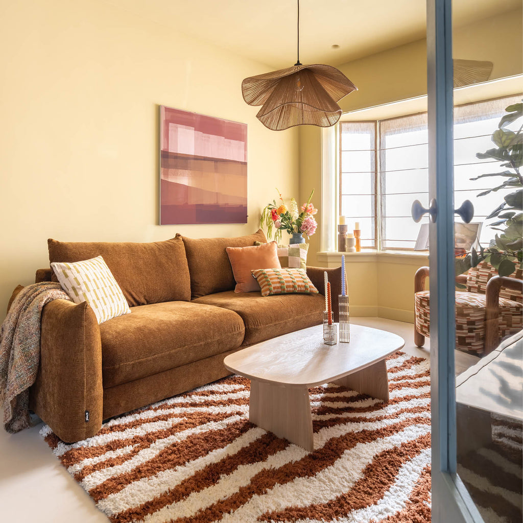 Home Tour: How to Make a Narrow Living Room Feel Warm and Spacious