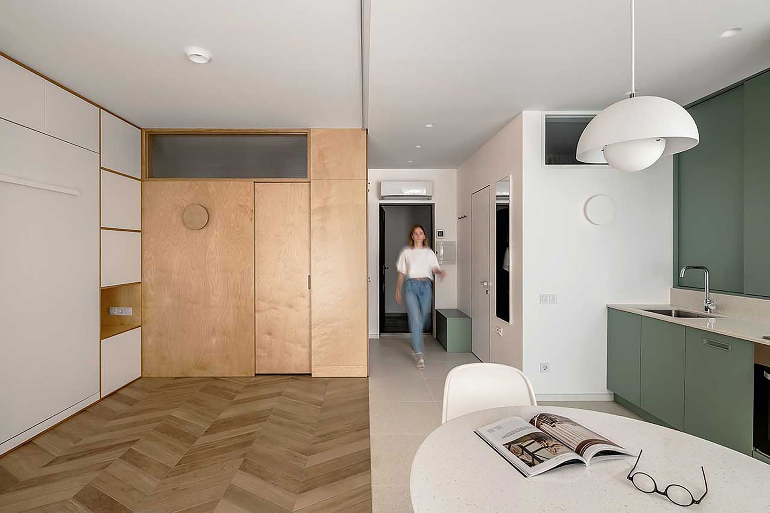 Minimalist Studio Apartment Renovation Includes a 'Room Within a Room'