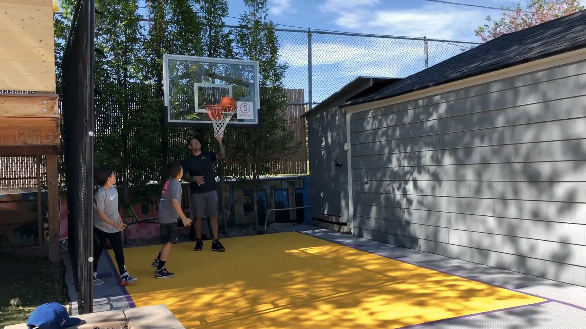Nick Rimando's Backyard Basketball Court