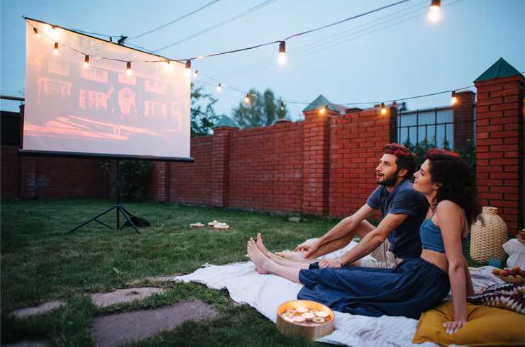 Outdoor cinema setup: projector, sound & cosy extras | Argos