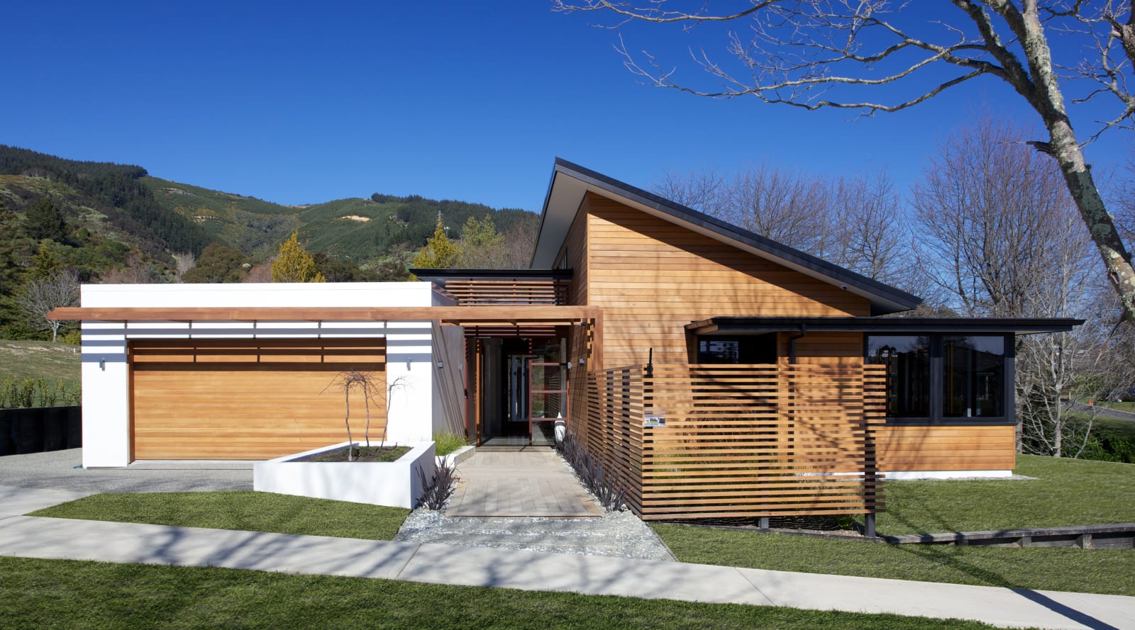 Show home with cedar timber, black and white… | Trends