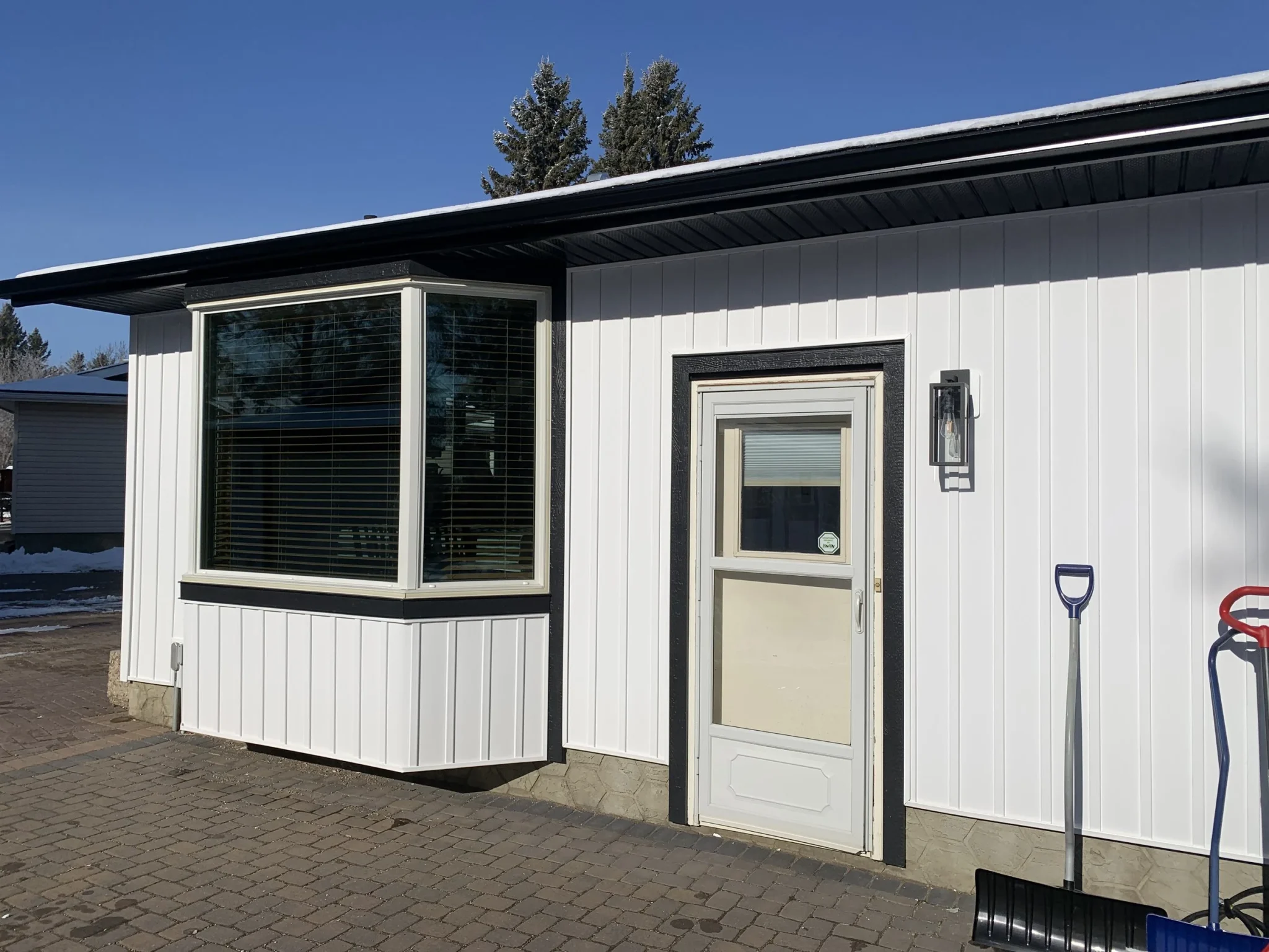 Vinyl Siding Modern Farmhouse Renovation — Blue Jay Exterior Renovations
