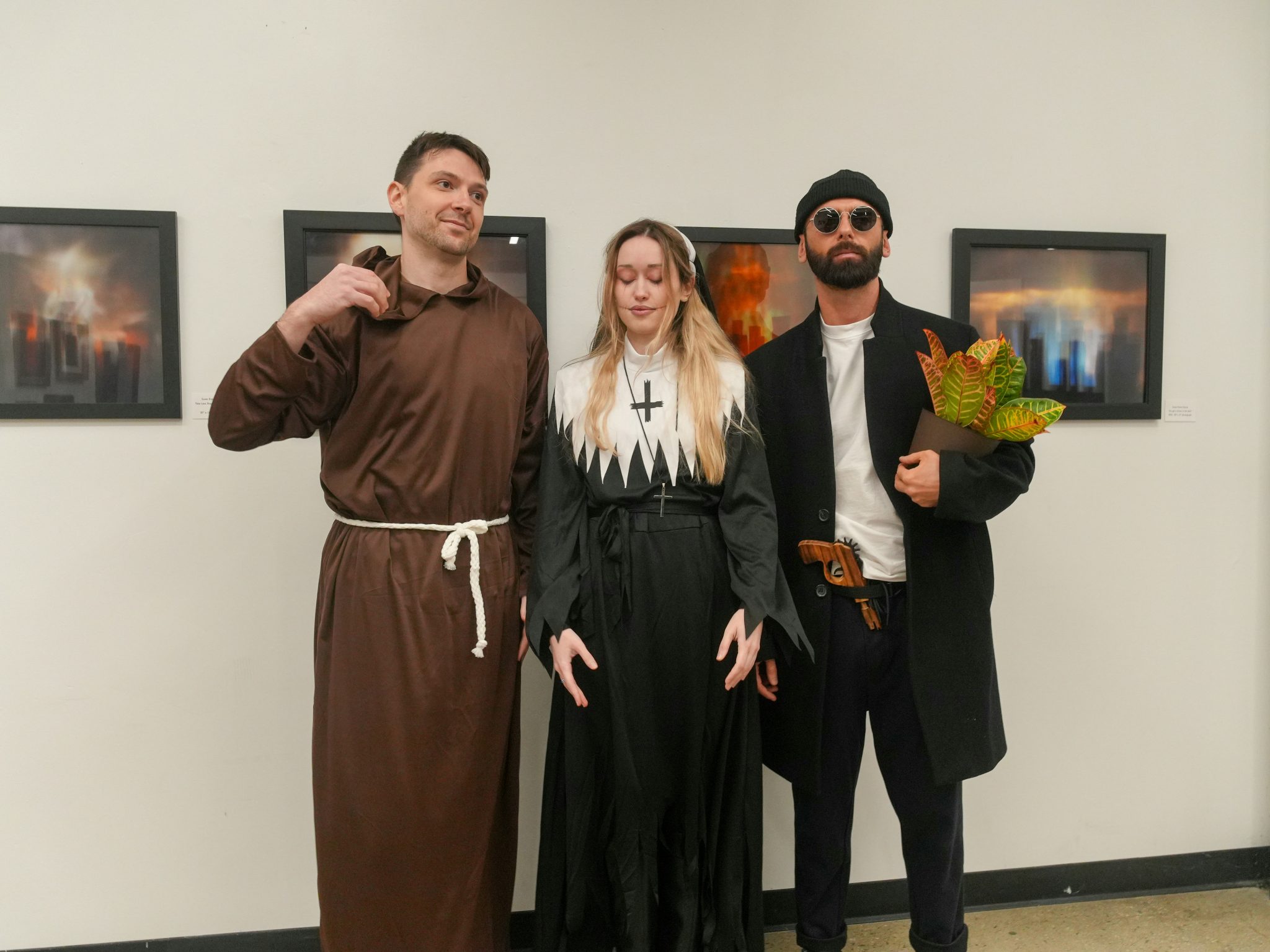 A candid black-and-white moment from a Ukrainian Halloween party. Costumes, makeup, and expressive gestures capture creativity, community, and cultural identity in a festive nighttime setting. The mon