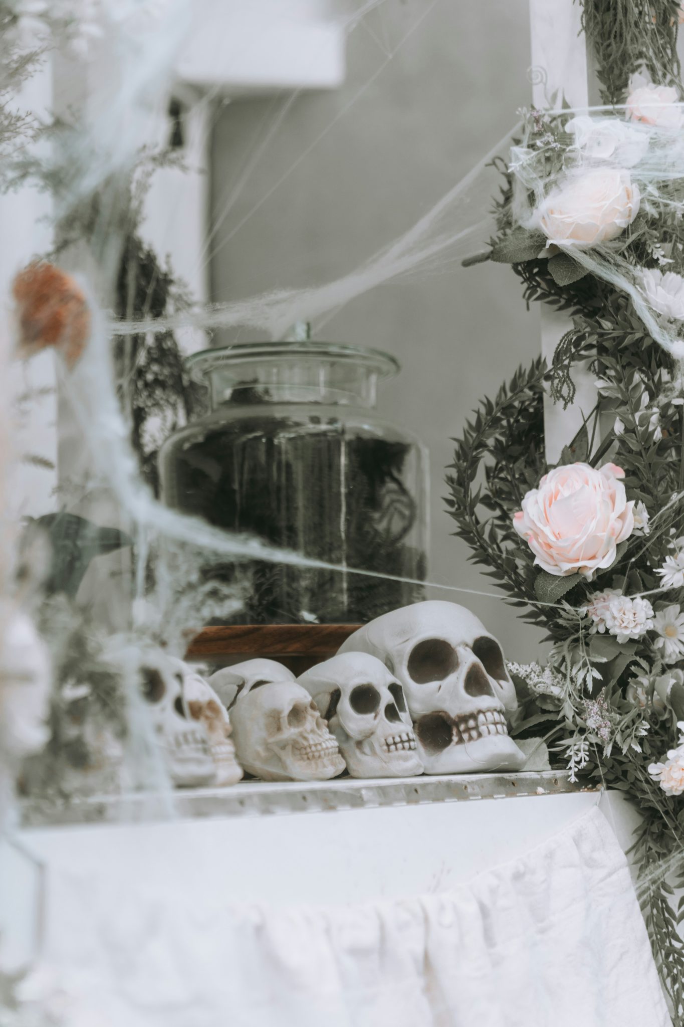 a mirror that has a bunch of skulls on it
