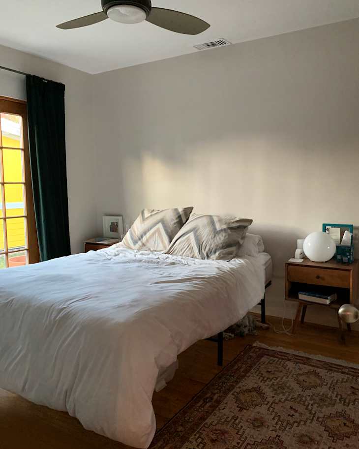 A Moody, Dark Green Bedroom Feels Taller with Picture Rail Molding | Apartment Therapy