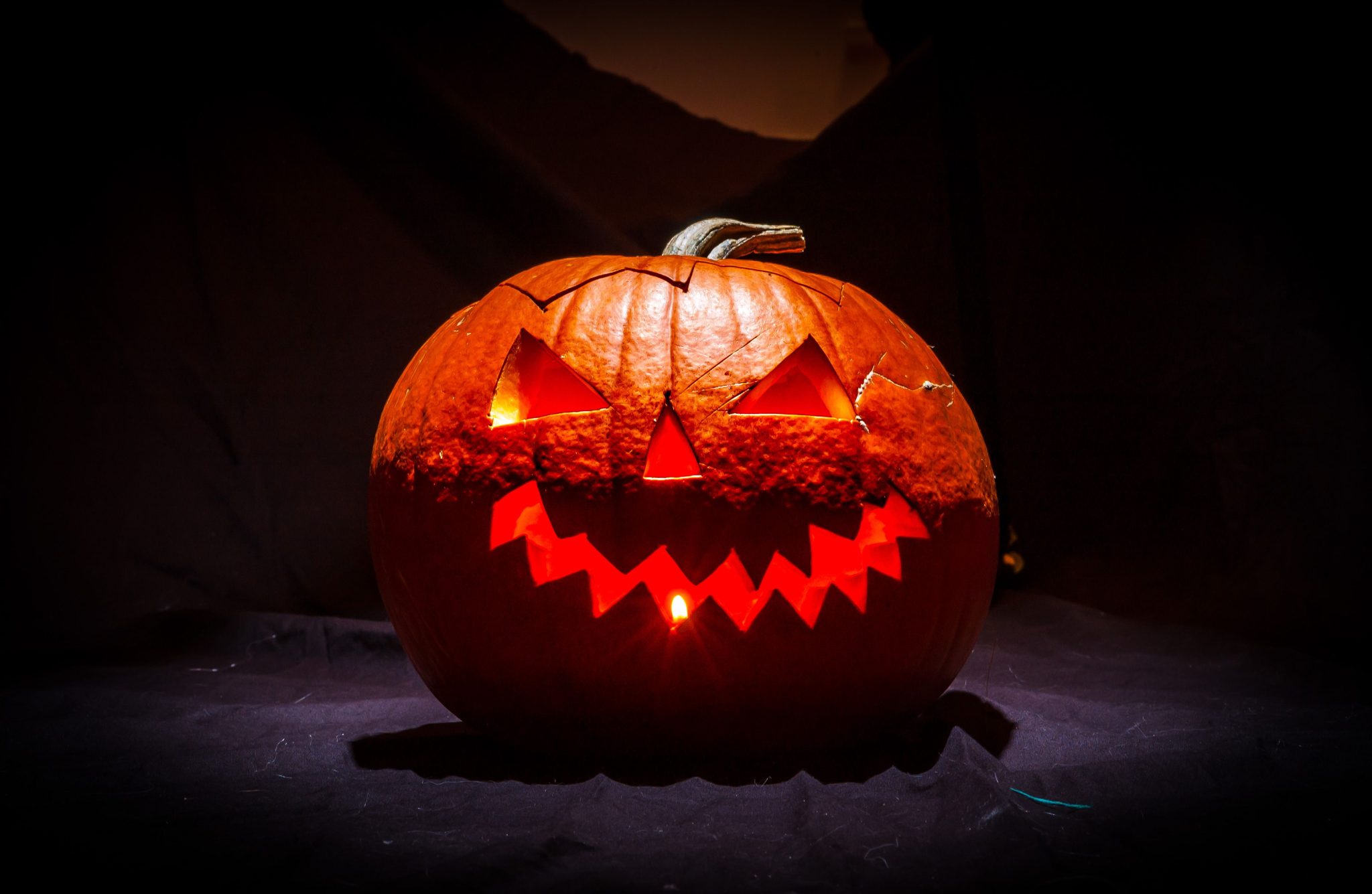 A spooky jack-o'-lantern with a glowing smile, perfect for Halloween celebrations.