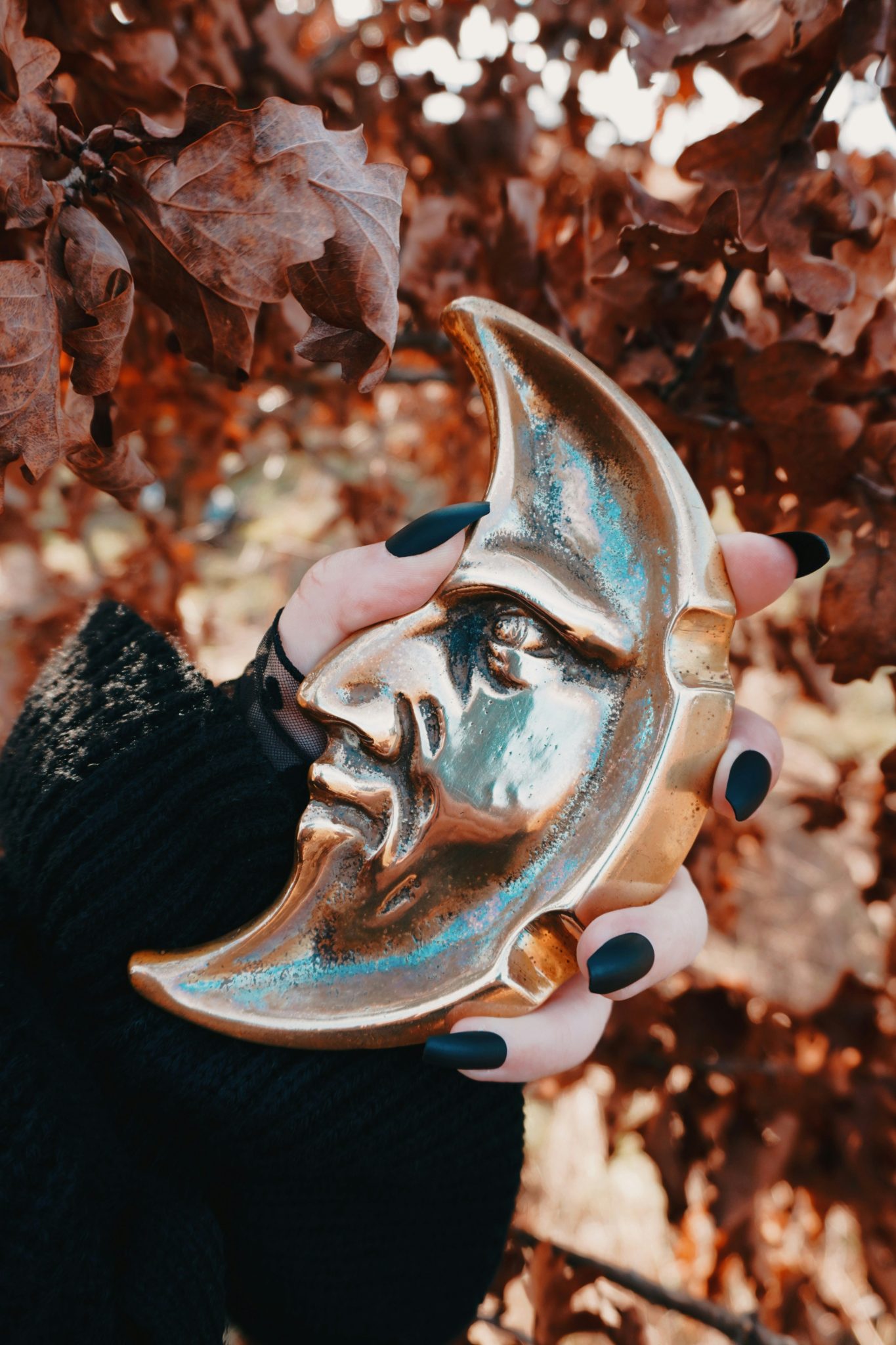 Brass Man in the Moon in an Autumnal setting.