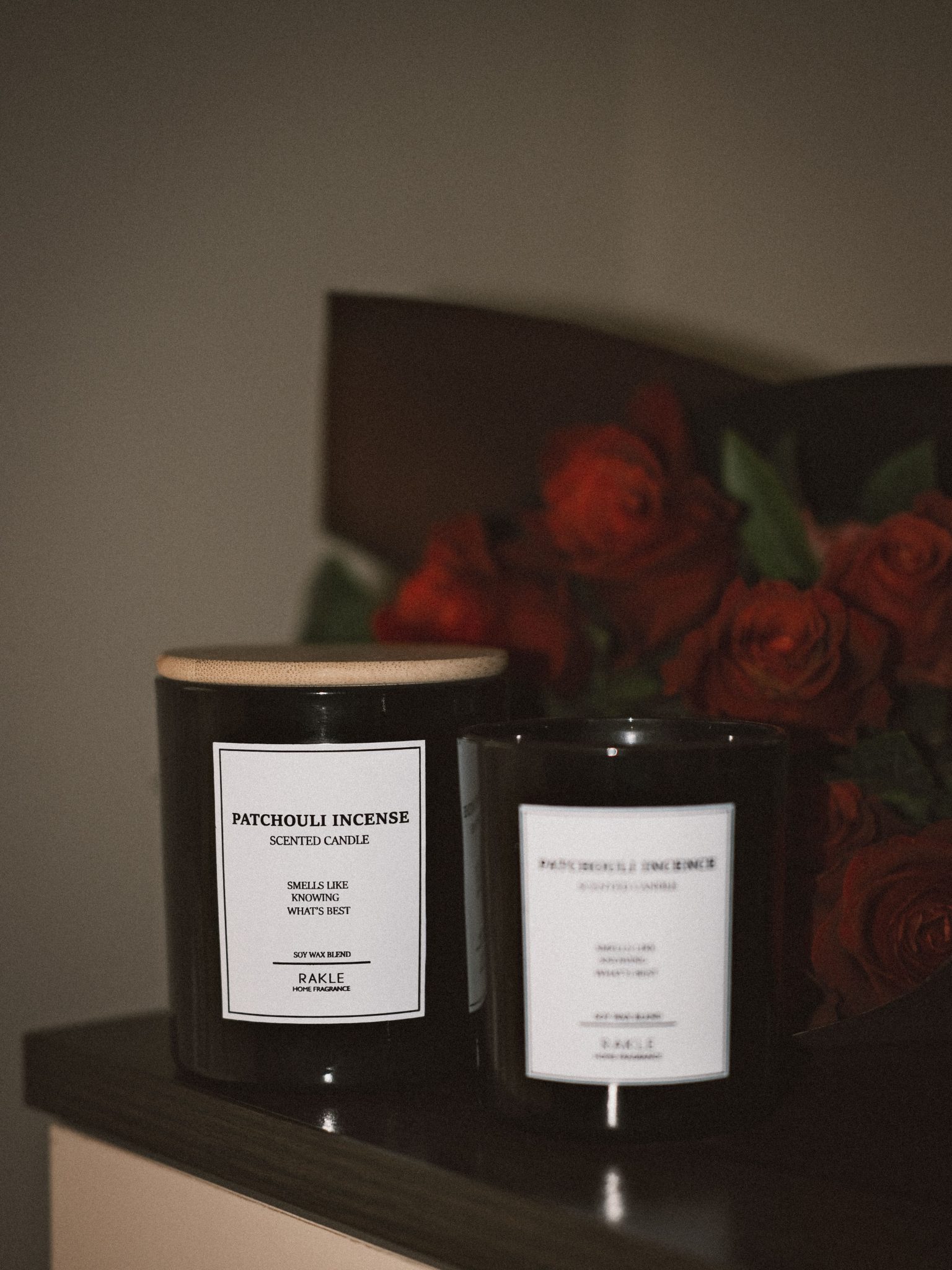 Luxurious scented candles with roses create an elegant and cozy ambiance.