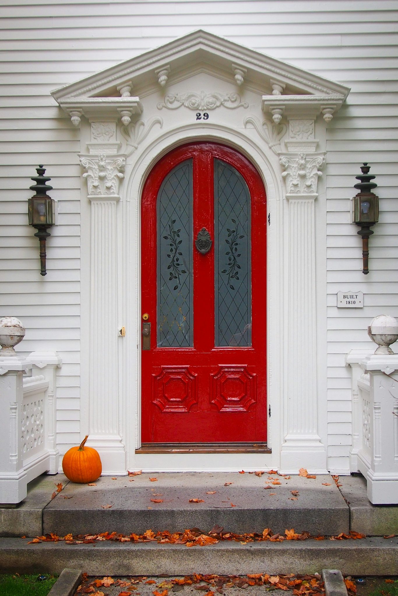On the Green in Woodstock are many classic homes with inviting entrances. This bright red door portends a lovely New England home on the other side.