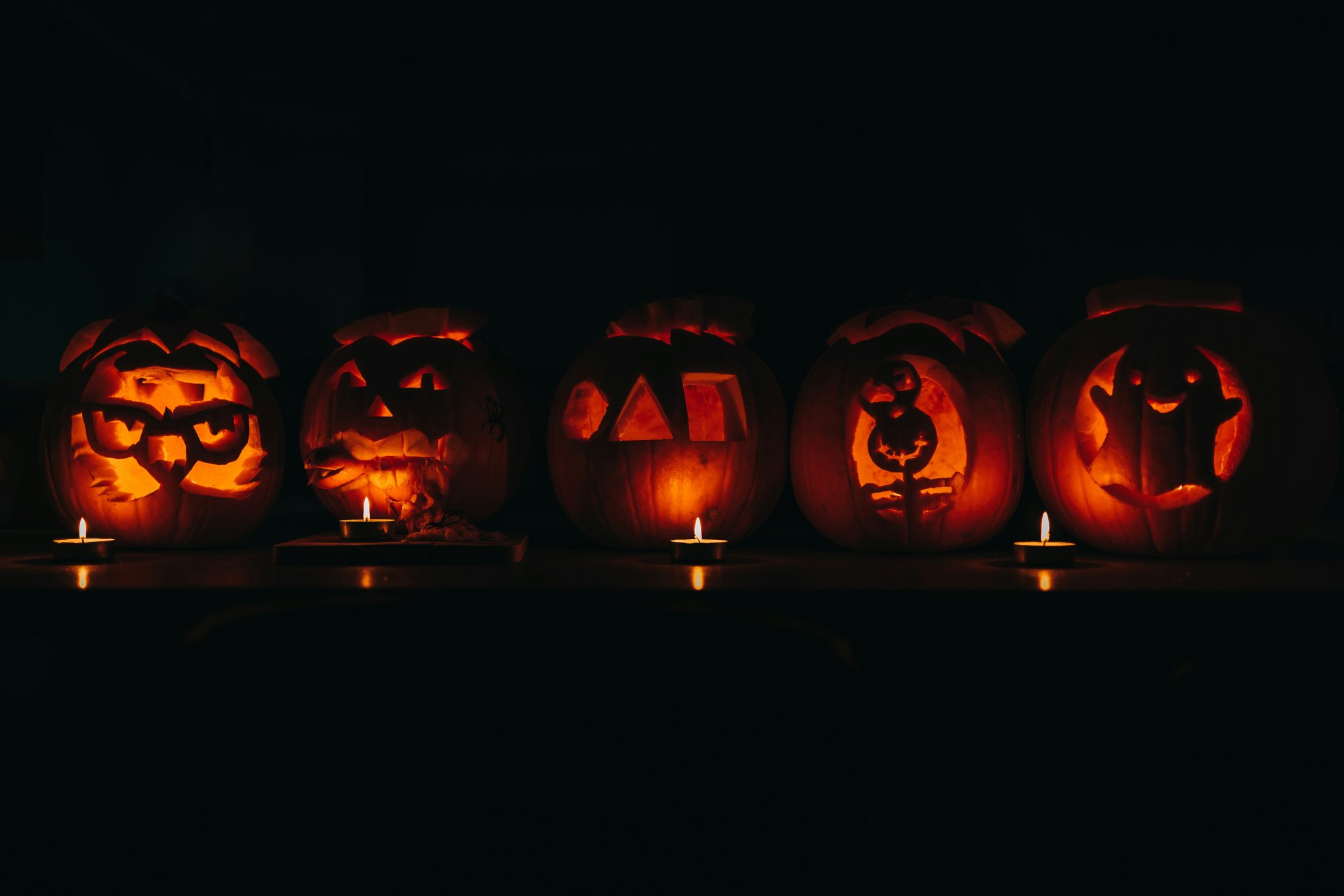This weekend we did a family pumpkin carving session, here's them all lined up :)