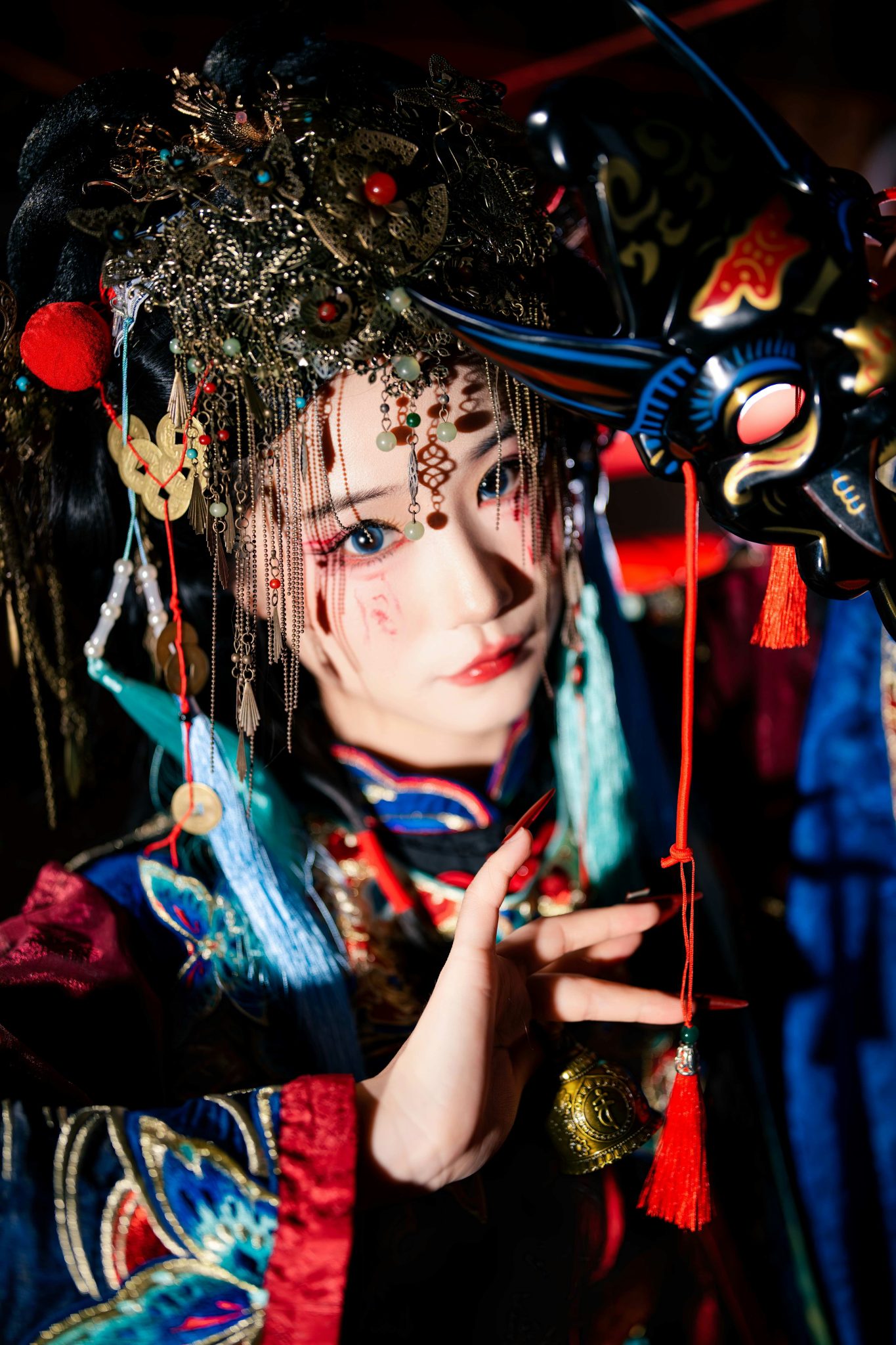 Woman in elaborate traditional costume and headdress