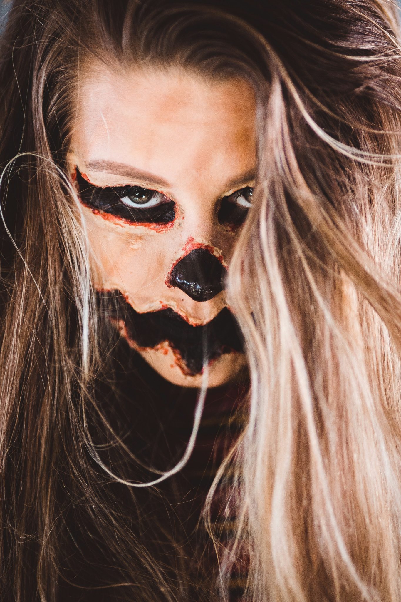 woman with black and white face paint