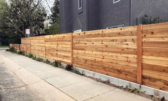 15 Fence on a Slope Ideas for Your Backyard | Ergeon