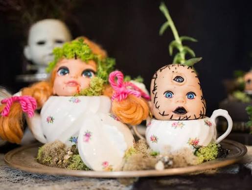 3 Ways to Make Creepy Doll Head Planters for Halloween | HGTV Doll head
