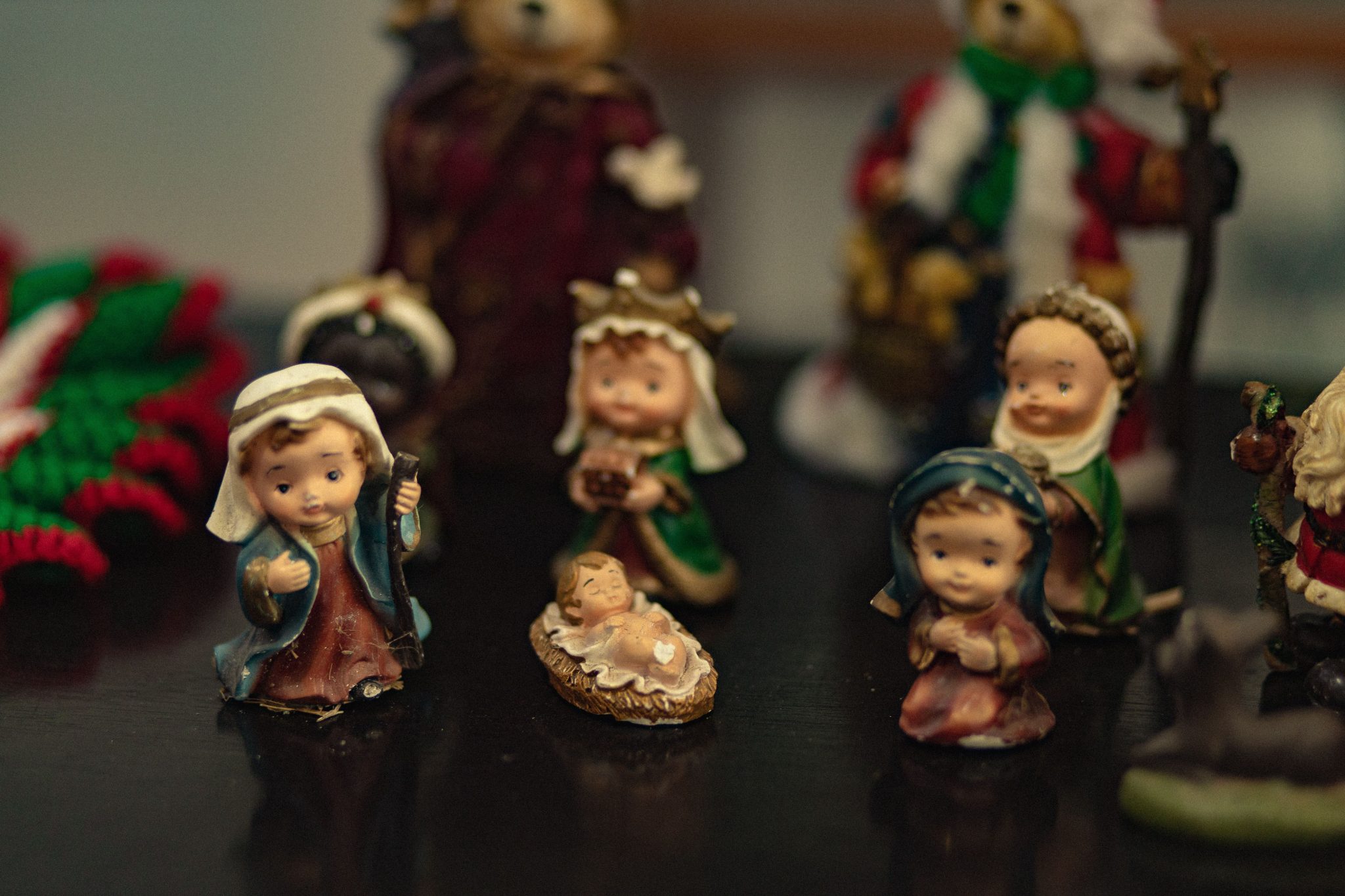 Close-up of Christmas nativity scene figurines capturing festive spirit.