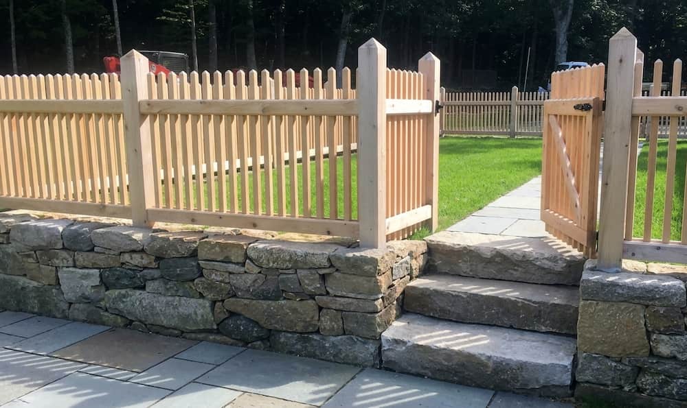 Fence Installation on Slopes: Step, Racked, and Level Methods
