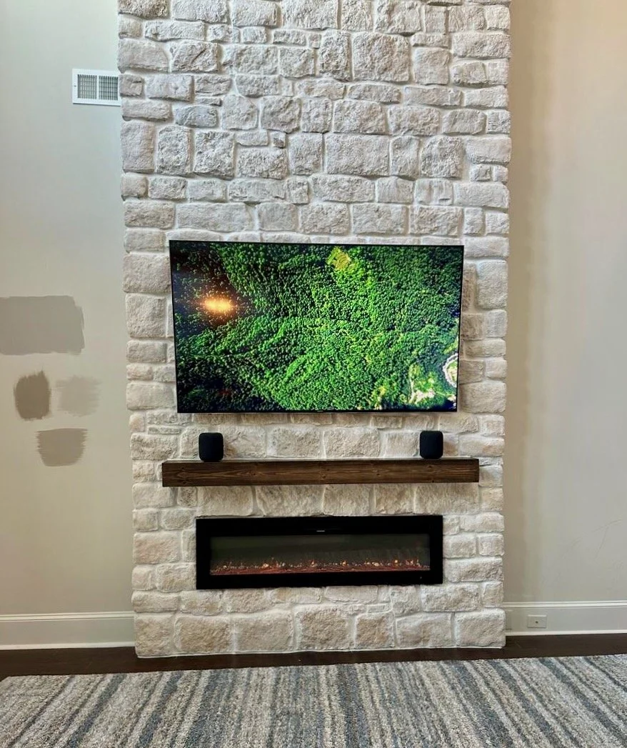 High Ceiling Stone Fireplace Media Wall Installation in Orlando | Florida Media Walls