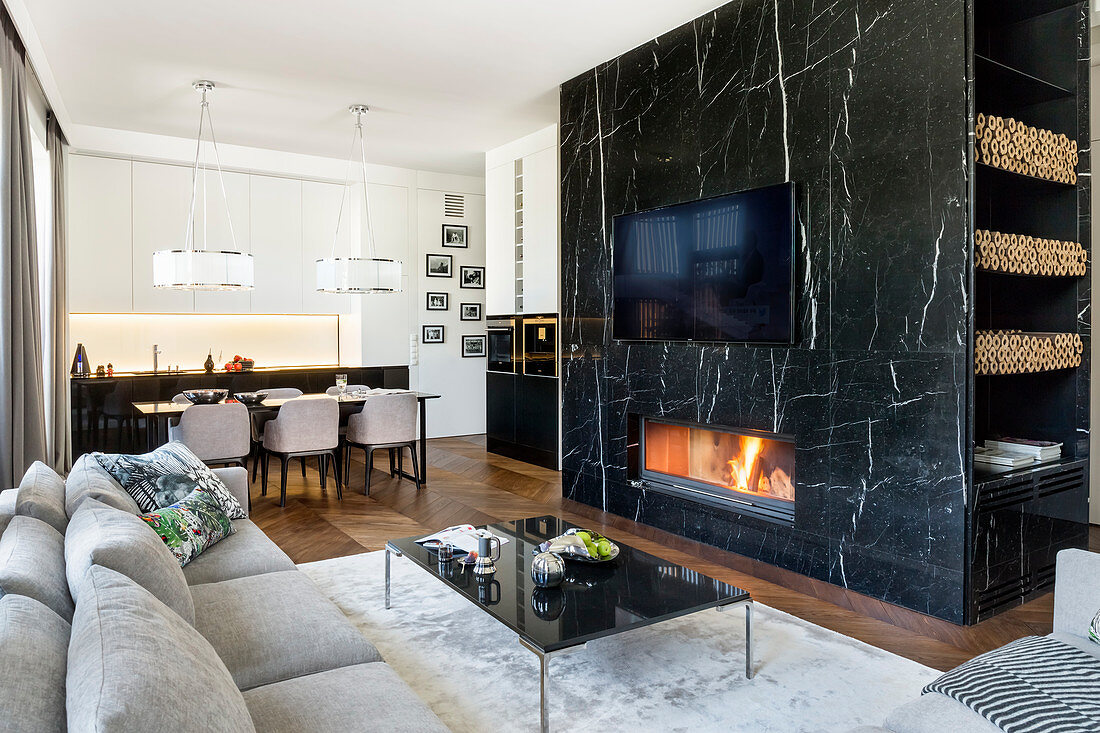 Marble wall with integrated fireplace … – License image – 12625167 ❘ Image Professionals