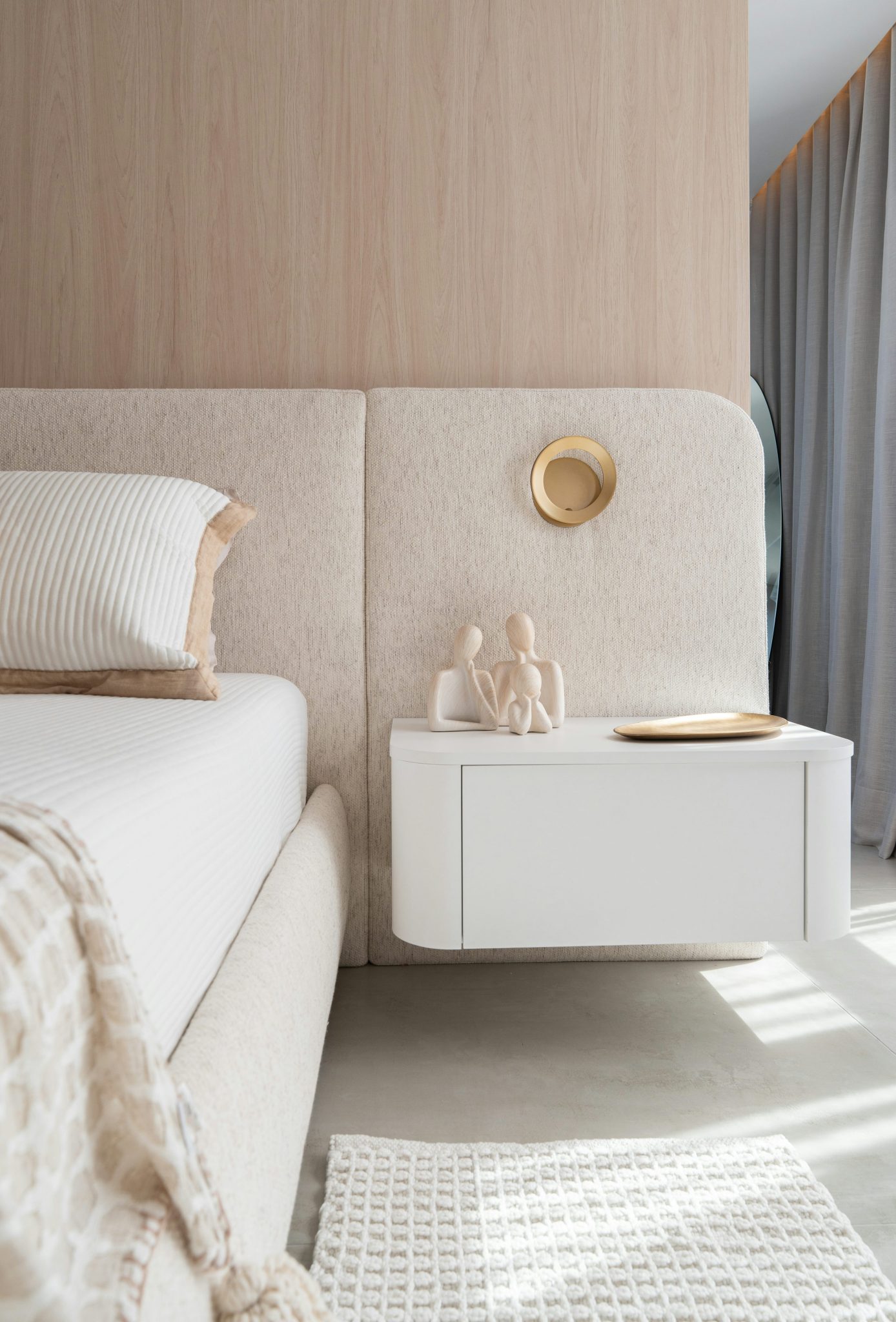 Modern bedroom with beige bed and floating white nightstand - Free Photo on Unsplash