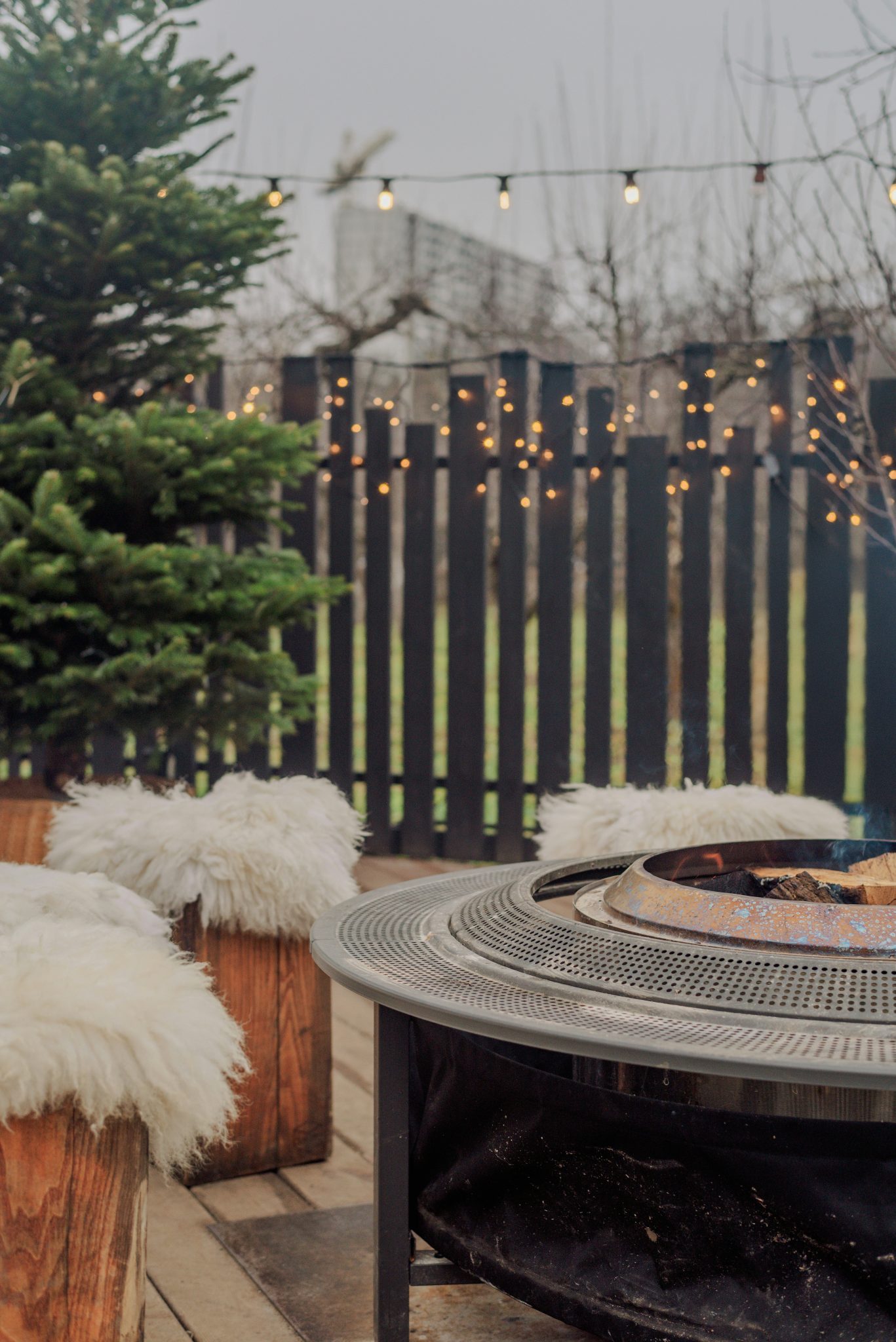 Outdoor patio with fire pit and cozy seating