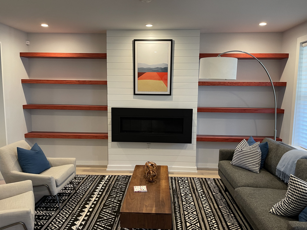 Stained Floating Shelves Surrounding Fireplace – Maryland Carpentry