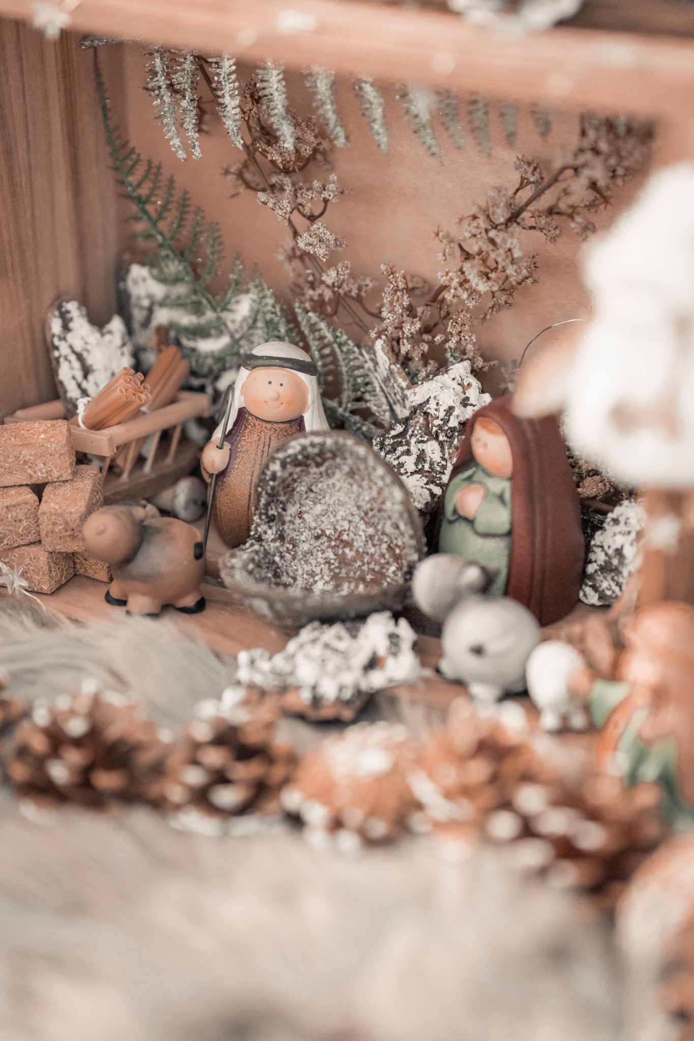Warm and detailed nativity scene with handcrafted figurines, perfect for holiday decorations.