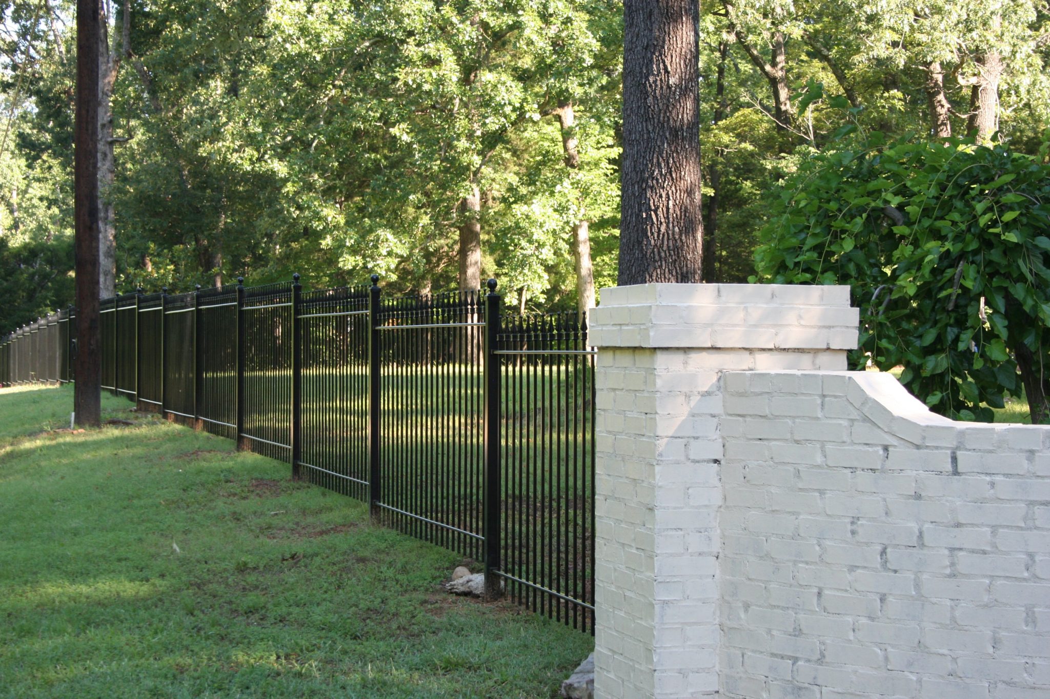 Wrought Iron Fence Installation on a Hill, Grade or Slope – Iron Fence Shop Blog