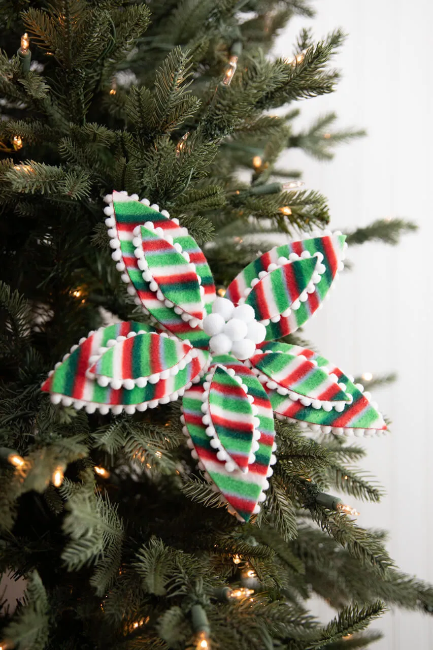 22” x 11' Candy Stripe Poinsettia Stem - Decorator's Warehouse