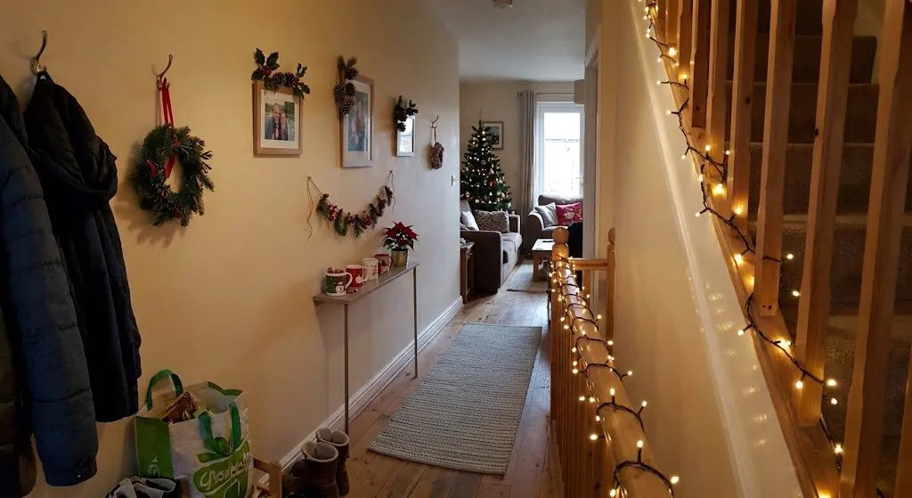7 Best Ideas for Decorating a Hallway for Christmas I Tried - wallsbloom.com