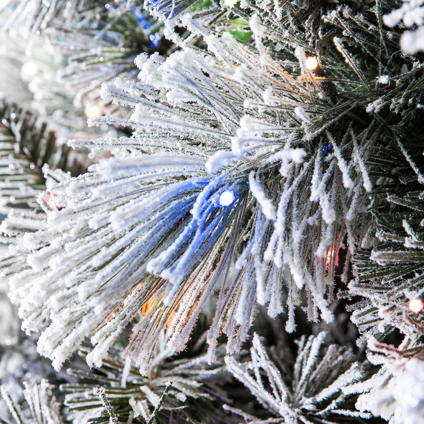 7.5 ft Pre-Lit Flocked Glitter Artificial Christmas Tree, 1,150 Color-Changing Radiant Micro LED Lights | Costco