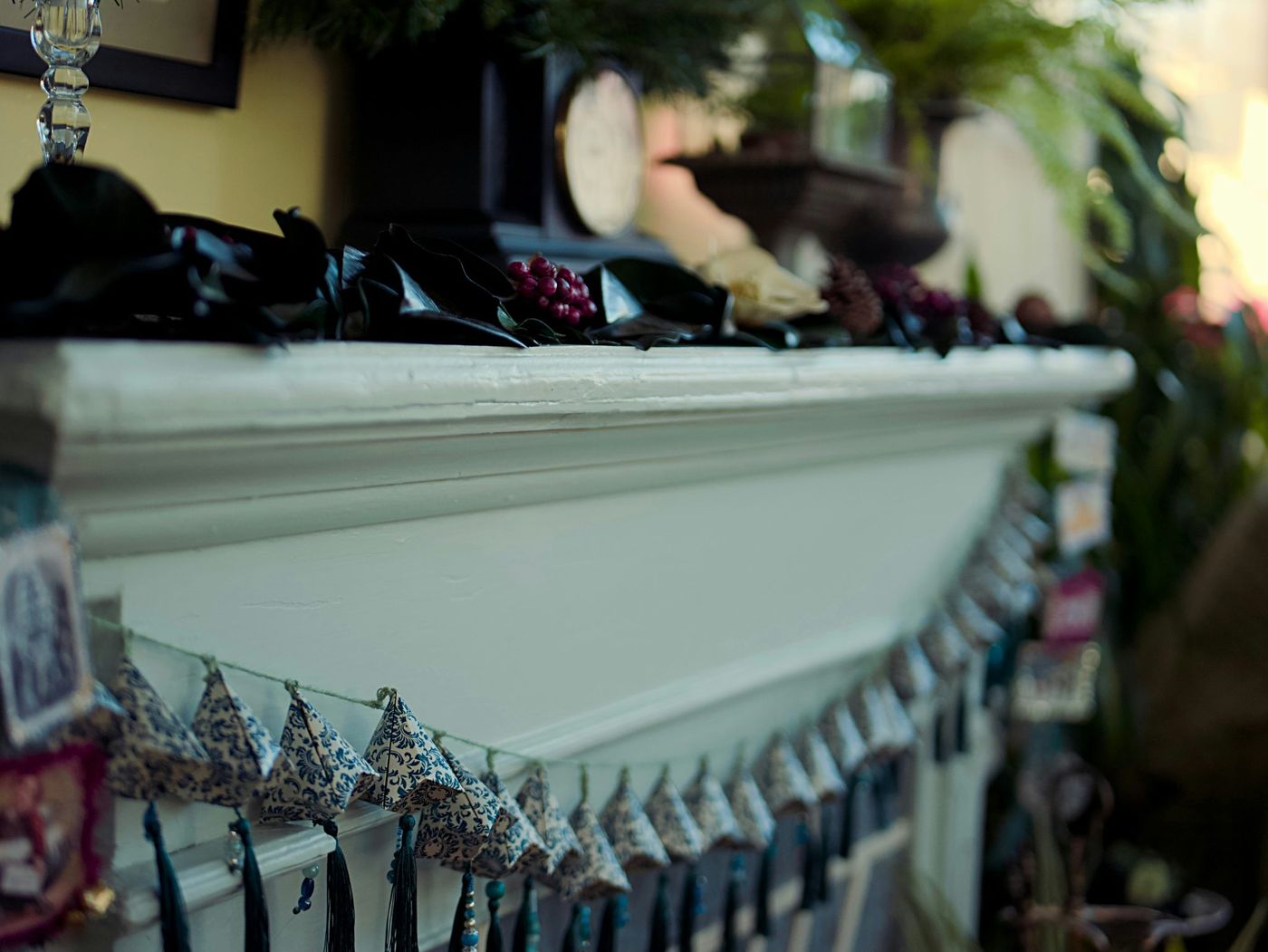 a mantle with a bunch of items on top of it