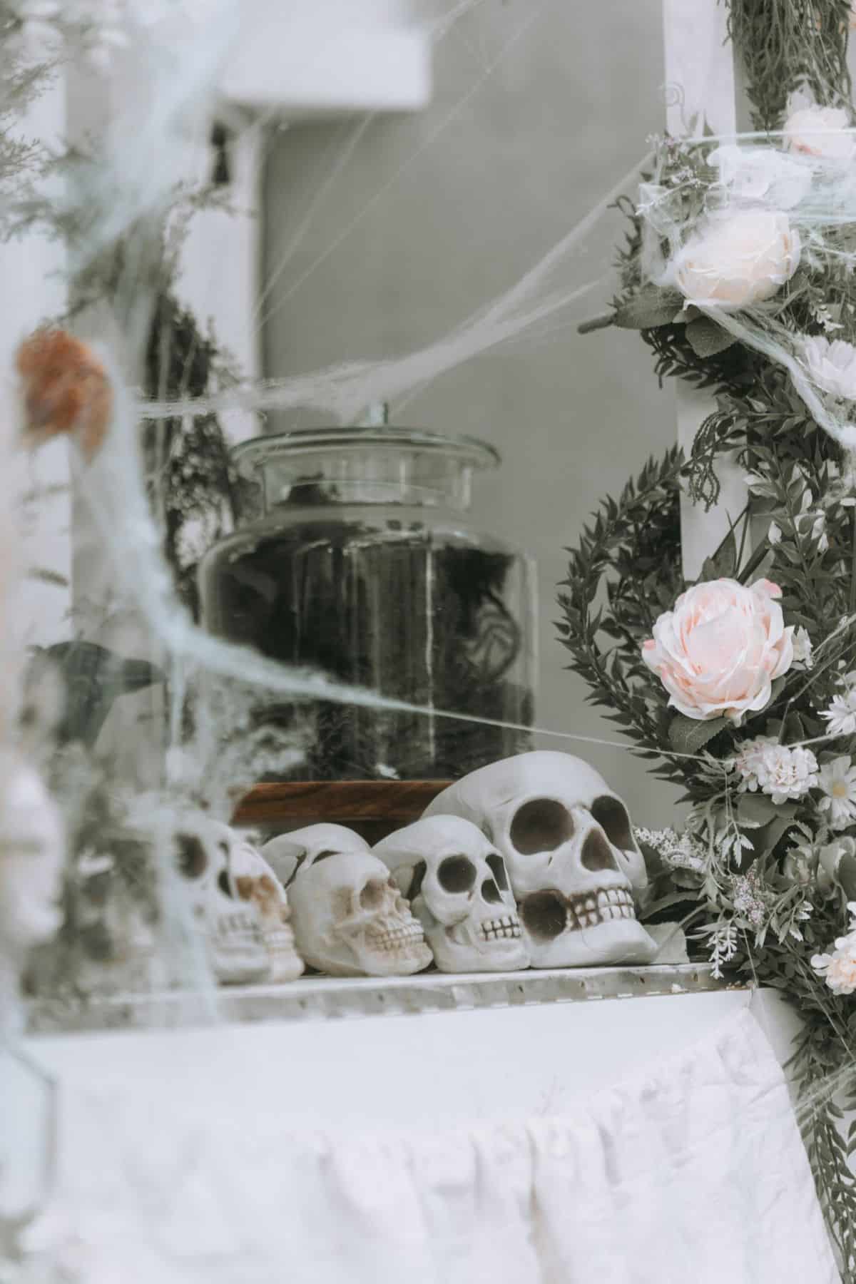 a mirror that has a bunch of skulls on it