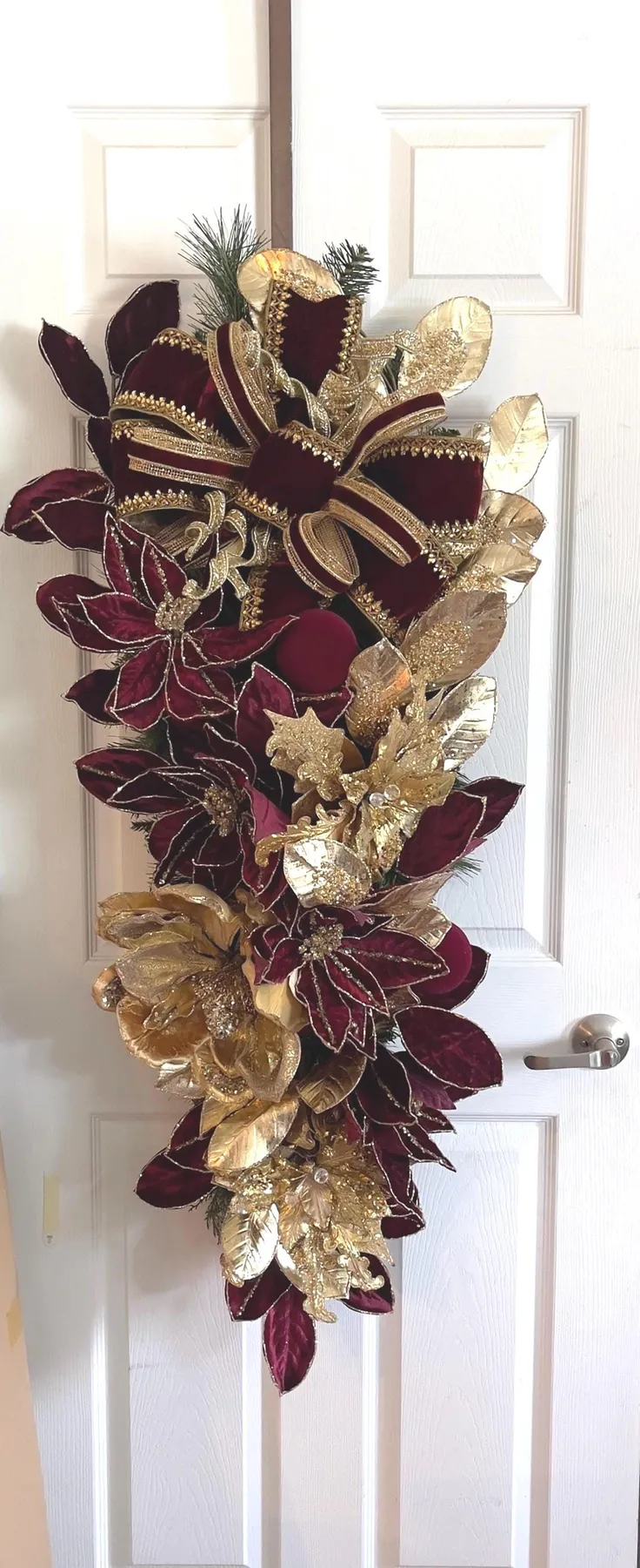 Burgundy velvet gold poinsettias magnolia Christmas designer teardrop swag  for front door