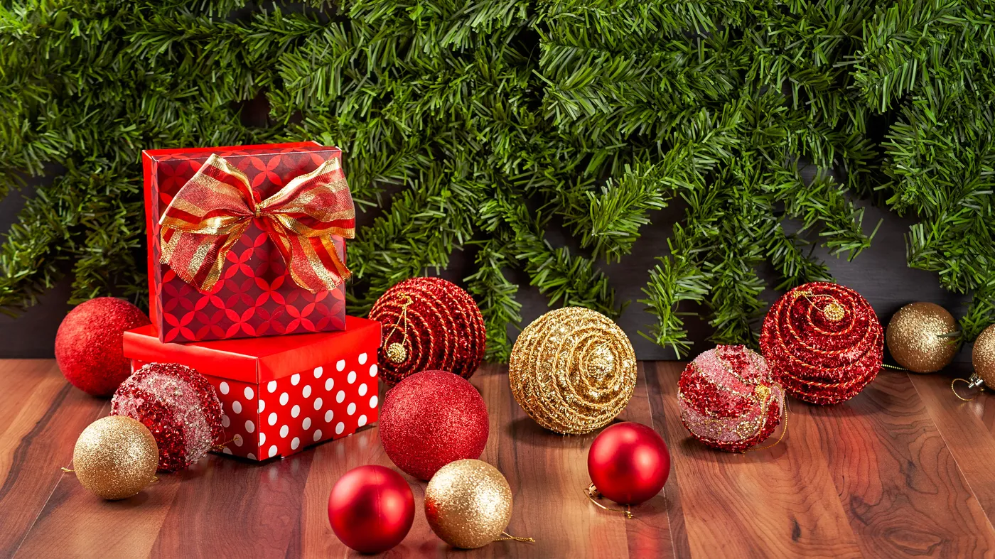 Celebrate the holidays with red gifts and festive decorations.