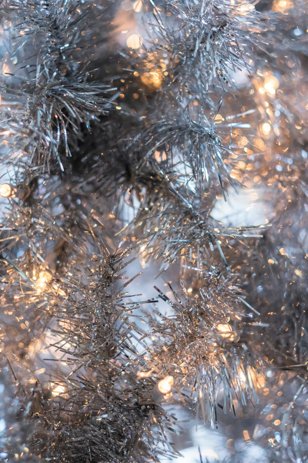Christmas Bokeh Tinsel Tree with Holiday White Lights that Sparkle
