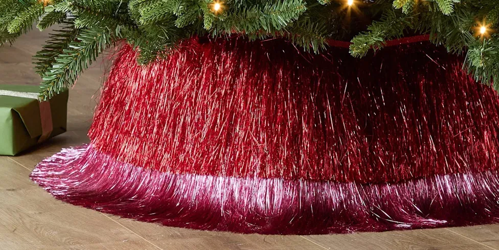 Christmas tree skirts are a big 2026 decorating trend and Very's £30 tinsel  design adds a maximalist touch - Yahoo Life UK