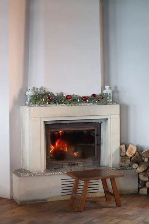 Cozy Winter Fireplace with Christmas Decor · Free Stock Photo
