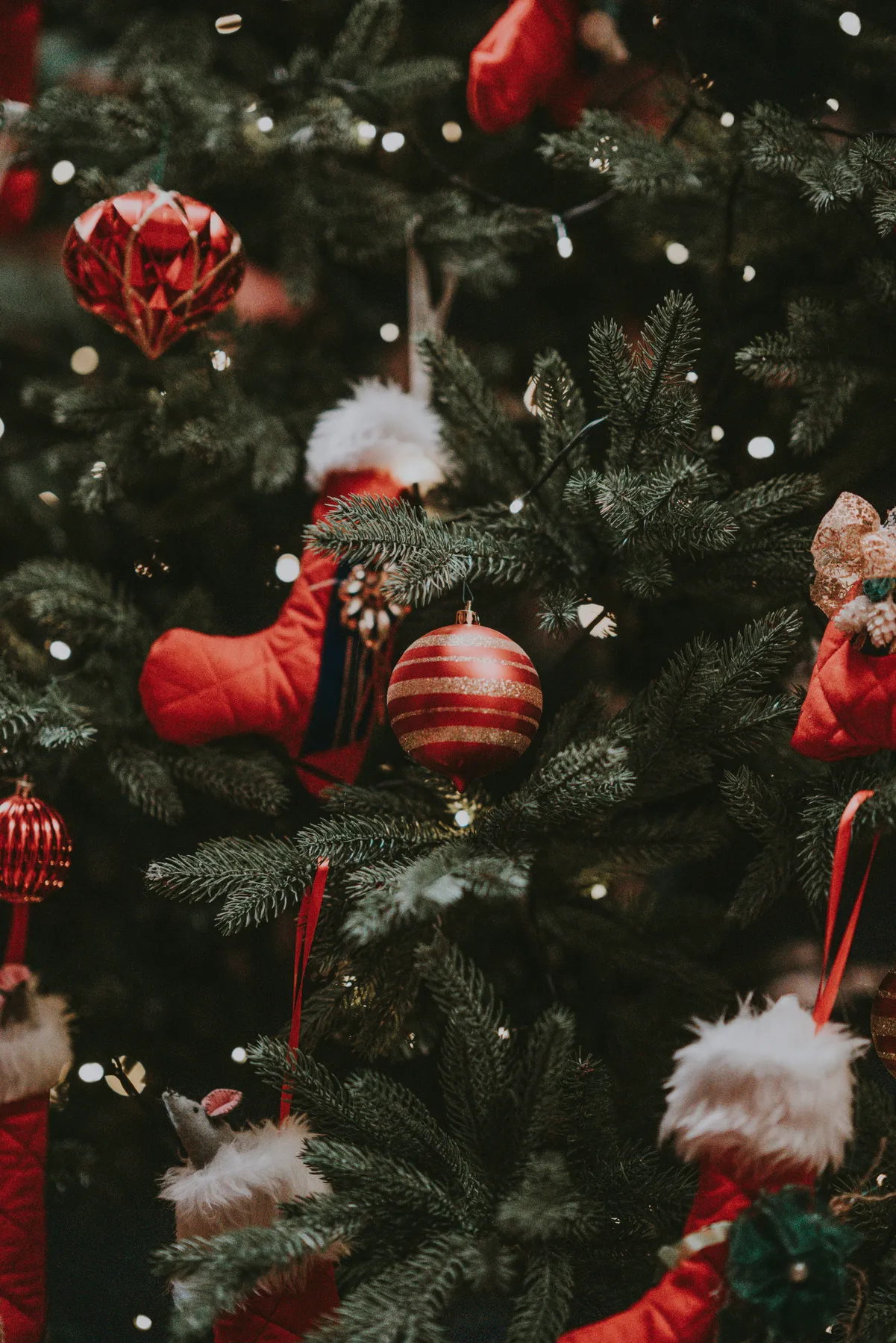 Decorations on Christmas tree, baubles, stocking