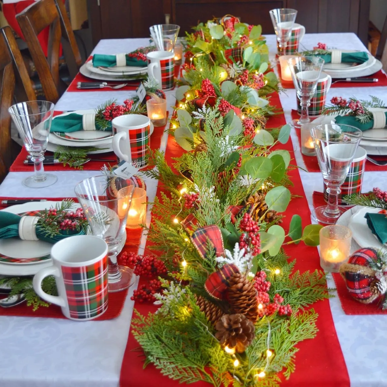 Dining Delight: Cozy Plaid Christmas Tablescape with Garland Centerpiece