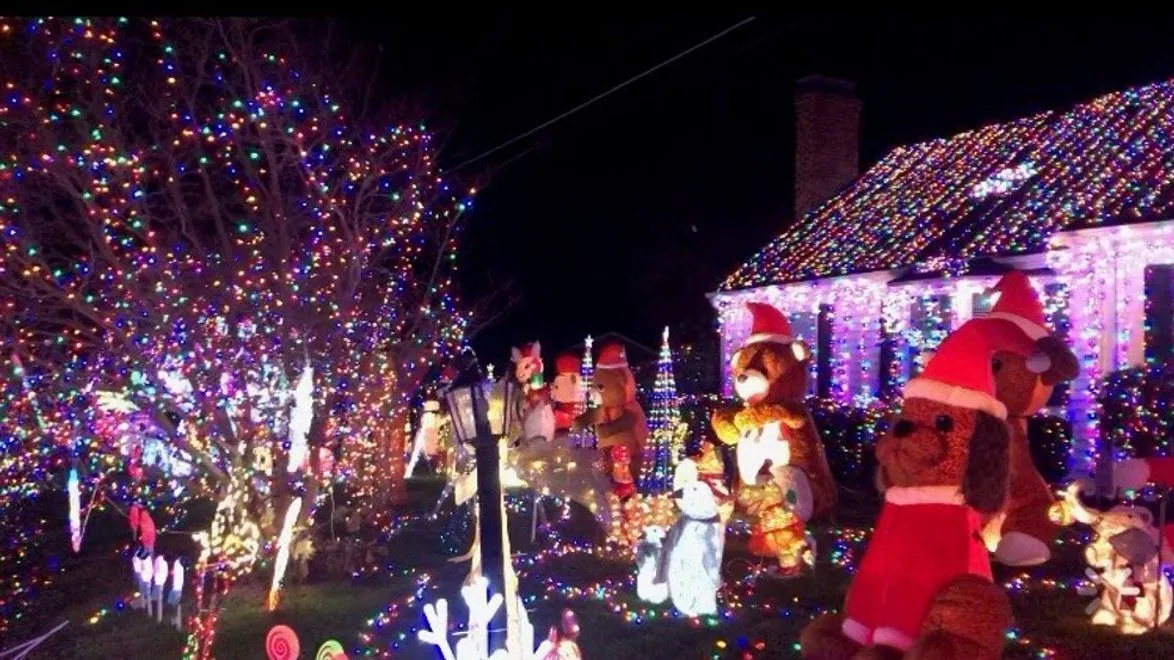 Family lights up Leesville Road with front yard Christmas lights display  and donation bin